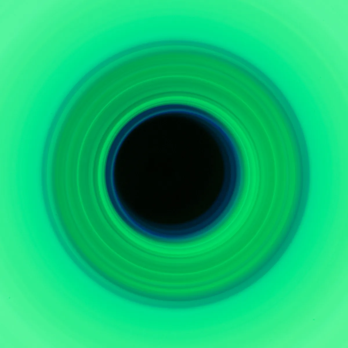 Green circular light artwork composed as a square creative