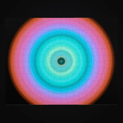 Circular light artwork shown on a jigsaw puzzle mockup