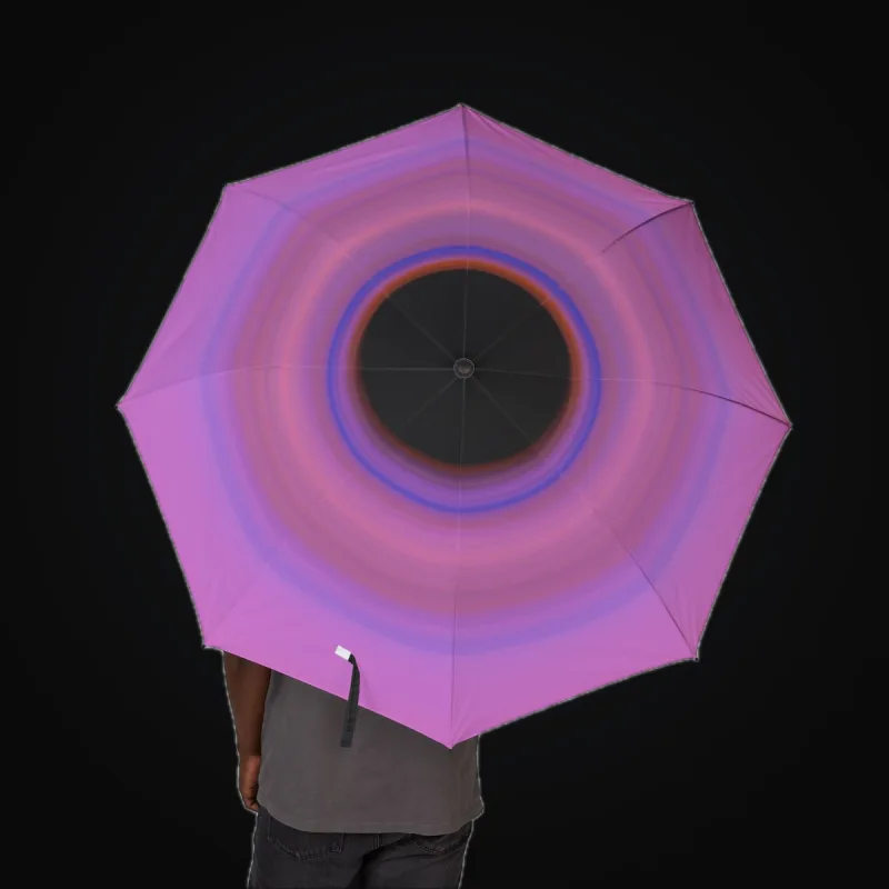 Circular light artwork shown on a foldable umbrella mockup